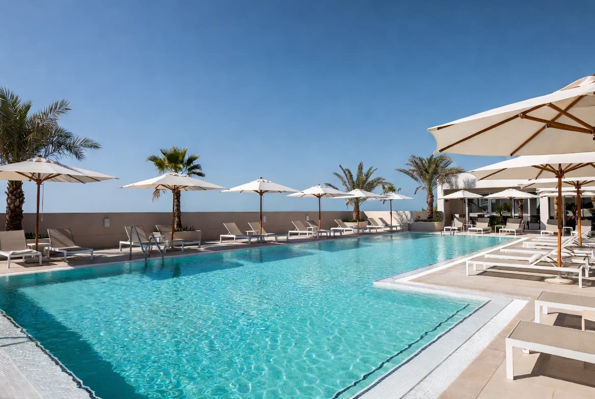 Swim club pool deck and cabana area during the summer season