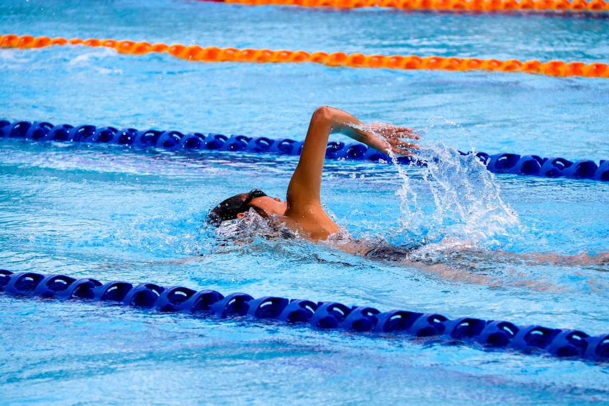 Outdoor swim club pool used as a placeholder hero image for the migration checklist page